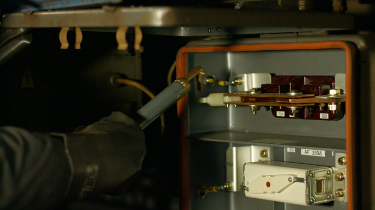 Electrician repairs mechanism. Electrician repairs mechanism. Electrical connection. Electropanel board.