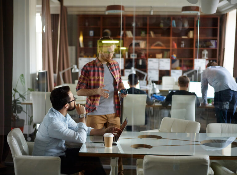 Group of businessmen working in office
