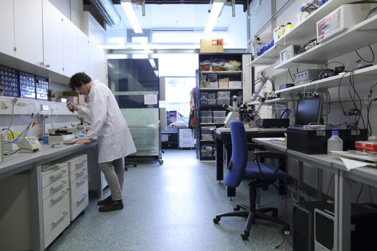 Scientist in a biological lab Scientist in a biological lab